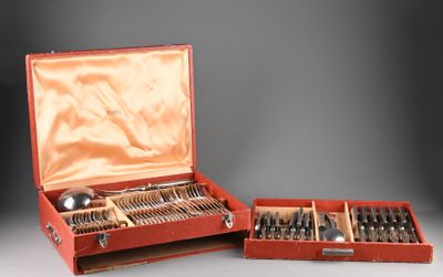 a red case with silverware in it on a table