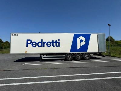 a semi truck that is parked in a parking lot