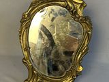 a mirror that is sitting on a table