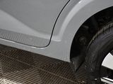 a close up of a car tire on the floor