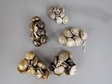 a lot of coins that are sitting on a table