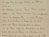 un gros plan d'un morceau de papier sur lequel on a écrit