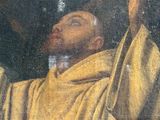 an image of a painting of a man in a yellow robe holding a cross
