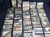 many old postcards that are on the table
