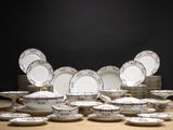 a lot of plates that are sitting on a table