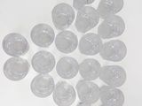 a lot of empty plastic cups sitting on a table