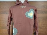 hooded sweatshirt with heart applique on chest and hoodie