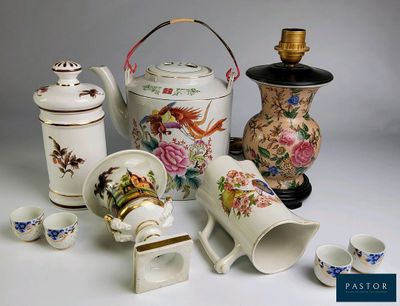 many different types of teapots and cups on the table