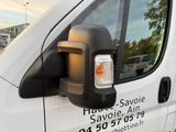 an image of a side view mirror of a truck