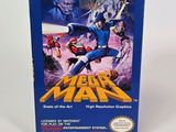 the box for the game mega man is sitting on a white surface
