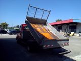 an image of a truck with a ramp in the back of it