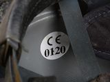 a close up of a helmet with a tag on it