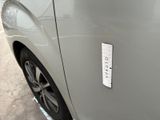 a sticker on the side of a car with a sticker on it