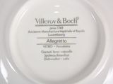 a white plate with a black and white label on it