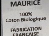 a label on a bottle of fabric that says maurice
