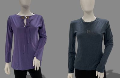 three mannequins wearing different colored shirts and black pants