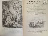 un livre ouvert sur lequel figure l'image d'un homme et d'une femme