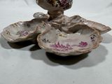 two small dishes that are sitting on a table