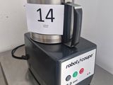 a silver blender sitting on top of a metal counter