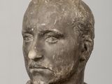 bust of a man with a collared shirt and a collared shirt