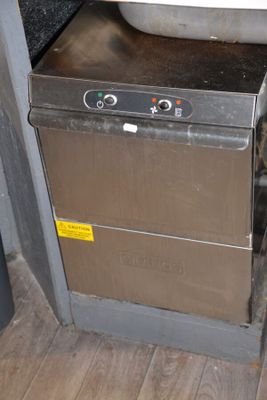 an image of a kitchen with a sink and a dishwasher