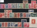 several different types of stamps are displayed on a black surface