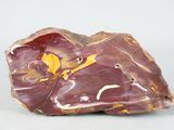 a rock that has a yellow and white design on it