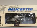 a box with a model of a helicopter in it