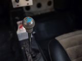 a close up of a gear stick in a car
