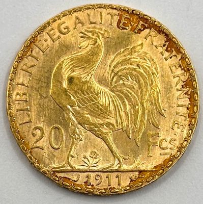 an image of a gold coin with an image of a rooster on it