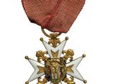 l'image d'une médaille surmontée d'une étoile