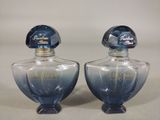 pair of vintage blue glass perfume bottles with gold trims