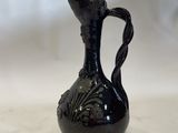 an image of a black vase on a white background