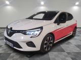 a white and red car is parked on a checkered floor