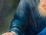 painting of jesus holding the sacred heart of jesus in his right hand