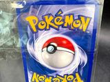 a close up of a box with a pokemon figure inside of it