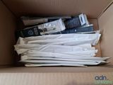 a cardboard box with a lot of items inside of it