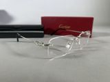 a pair of glasses sitting on a table next to a pair of glasses
