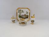a picture of a tea set on a white table