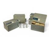 three boxes of wine glasses and a box of wine glasses