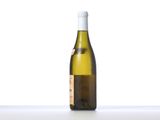 a bottle of wine that is sitting on a table