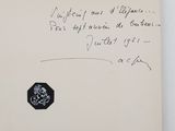 an old black and white photo of a handwritten note on a piece of paper