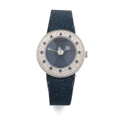 an image of a lady ' s wrist watch with diamonds and sapphires