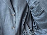 an image of a man ' s suit and tie on a mannequin mannequin mannequin mannequin mannequin mannequin
