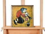 un tableau posé sur un chevalet représentant un homme