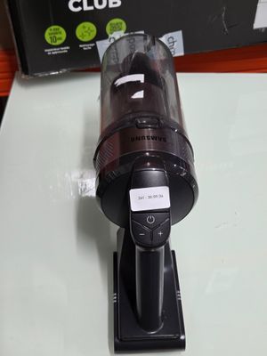 a black blender sitting on a counter next to a box