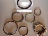 a lot of rings that are sitting on a table