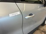 a car with a sticker on the door of it