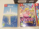 three nintendo wii games are sitting on a table next to a box of wii games