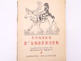 un vieux livre sur lequel figure le dessin d'une femme à cheval
